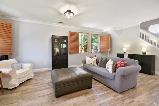 712 Tahoe Ct, Fairfield, CA 94534 - living area featuring ornamental molding, baseboards, light wood-style floors, and stairway