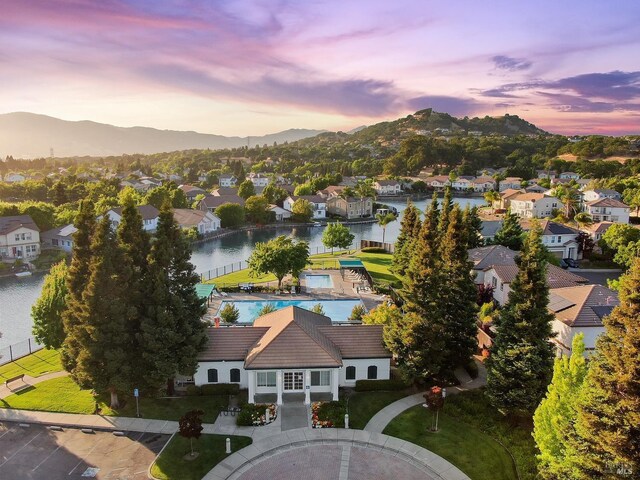 712 Tahoe Ct, Fairfield, CA 94534 - aerial view of residential area with a pool and a water and mountain view