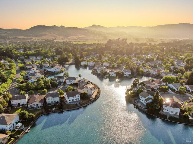 712 Tahoe Ct, Fairfield, CA 94534 - aerial view at dusk of a residential view and a water and mountain view