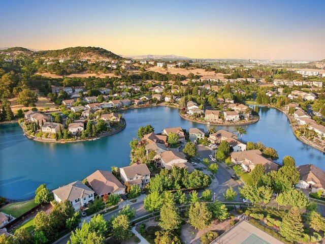 712 Tahoe Ct, Fairfield, CA 94534 - aerial view at dusk of a residential view and a water view