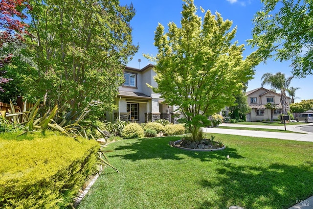 712 Tahoe Ct, Fairfield, CA 94534 - view of front facade with stucco siding and a front yard