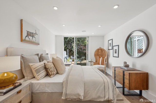 56 Aztec St, San Francisco, CA 94110 - bedroom with wood finished floors, recessed lighting, and baseboards