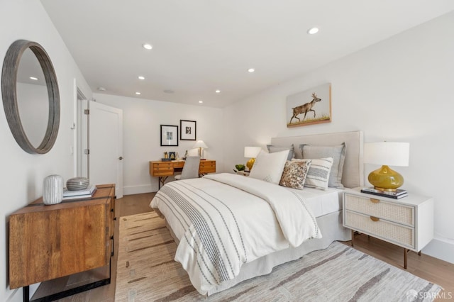 56 Aztec St, San Francisco, CA 94110 - bedroom featuring light wood finished floors, recessed lighting, baseboards, and an office area