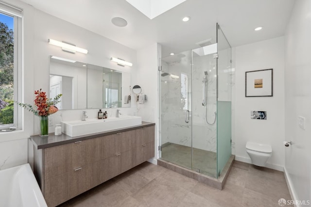 56 Aztec St, San Francisco, CA 94110 - full bathroom with a marble finish shower, double vanity, toilet, baseboards, and a skylight