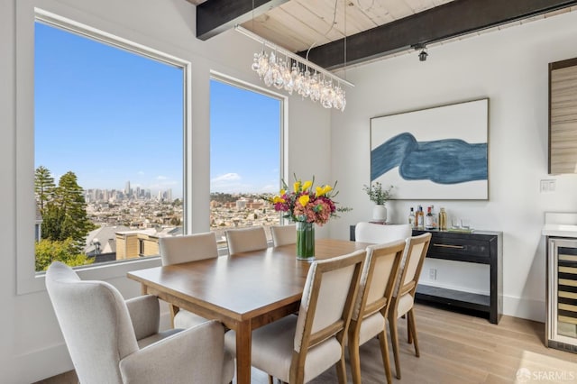 56 Aztec St, San Francisco, CA 94110 - dining room with light wood-style flooring, beamed ceiling, beverage cooler, and rail lighting