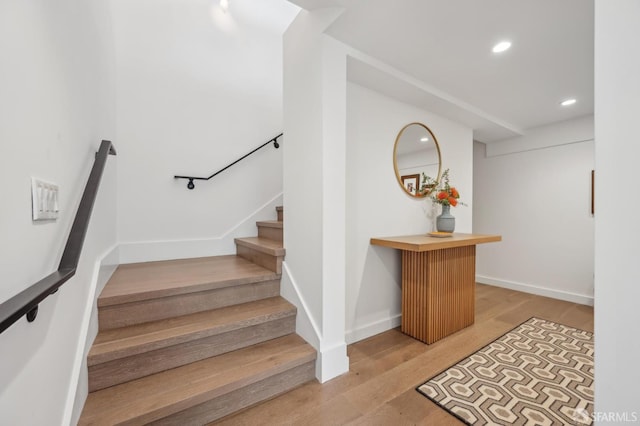 56 Aztec St, San Francisco, CA 94110 - stairs featuring wood finished floors and recessed lighting