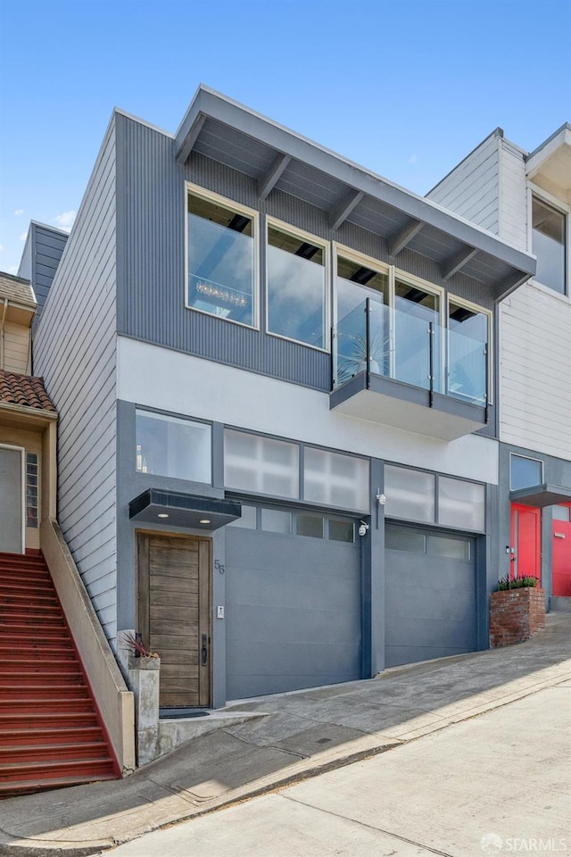 56 Aztec St, San Francisco, CA 94110 - contemporary house featuring an attached garage and driveway