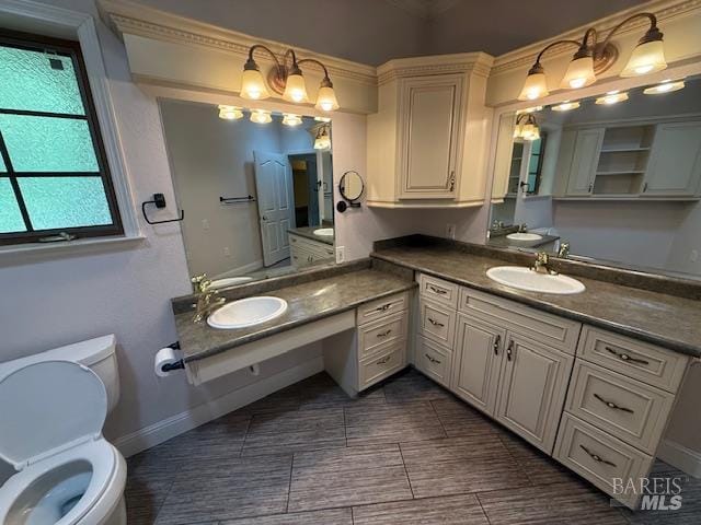 350 N Barnes St, Ukiah, CA 95482 - full bathroom featuring toilet, baseboards, and vanity