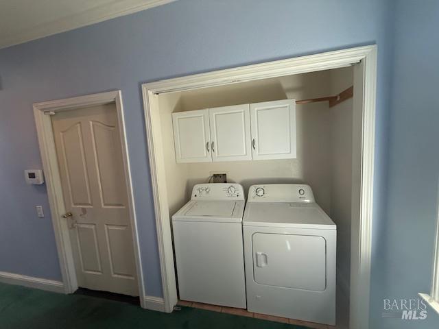 350 N Barnes St, Ukiah, CA 95482 - laundry area with washer and dryer, cabinet space, and baseboards