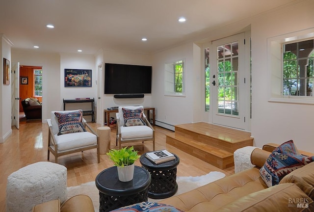 3850 Montecito Ave, Santa Rosa, CA 95404 - living area with baseboard heating, plenty of natural light, light wood finished floors, recessed lighting, and crown molding