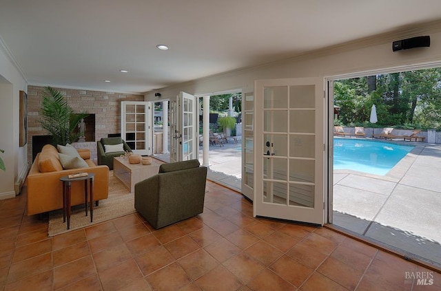 3850 Montecito Ave, Santa Rosa, CA 95404 - tiled living area with ornamental molding, french doors, healthy amount of natural light, and recessed lighting