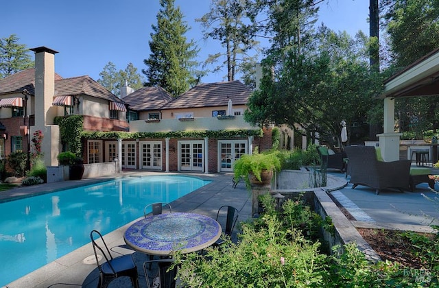 3850 Montecito Ave, Santa Rosa, CA 95404 - swimming pool featuring french doors, a patio, and outdoor dining space