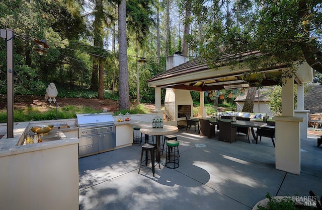 3850 Montecito Ave, Santa Rosa, CA 95404 - view of patio / terrace with an outdoor fireplace, a gazebo, and outdoor dining space