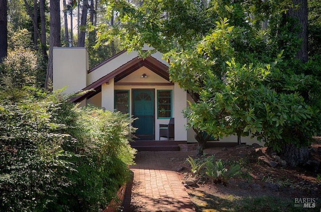 3850 Montecito Ave, Santa Rosa, CA 95404 - view of front of house featuring a chimney and stucco siding