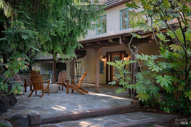 3850 Montecito Ave, Santa Rosa, CA 95404 - property entrance featuring stucco siding and a patio area