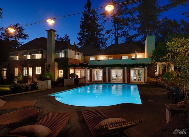 3850 Montecito Ave, Santa Rosa, CA 95404 - swimming pool with french doors and a patio