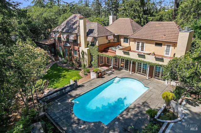3850 Montecito Ave, Santa Rosa, CA 95404 - swimming pool with french doors and a patio area