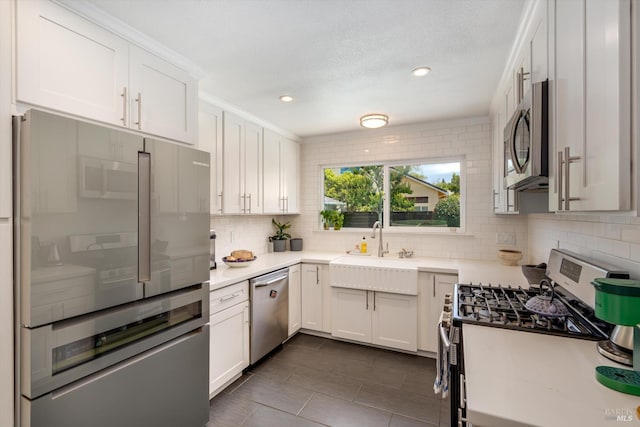 4260 Plass Dr, Napa, CA 94558 - kitchen with appliances with stainless steel finishes, tasteful backsplash, a sink, light countertops, and recessed lighting