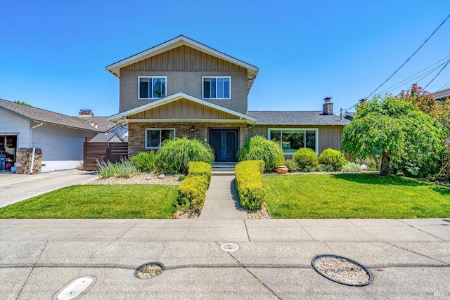 4260 Plass Dr, Napa, CA 94558 - traditional-style home with brick siding, a front lawn, and board and batten siding
