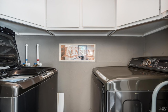 4260 Plass Dr, Napa, CA 94558 - washroom featuring cabinet space and independent washer and dryer