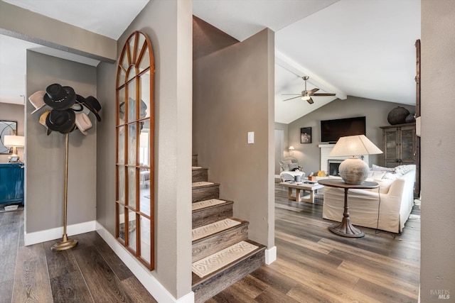 4260 Plass Dr, Napa, CA 94558 - stairs with wood finished floors, ceiling fan, baseboards, and a fireplace
