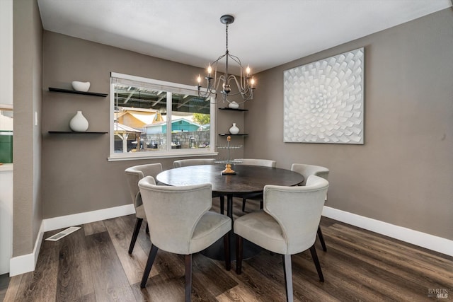 4260 Plass Dr, Napa, CA 94558 - dining room featuring a chandelier, wood finished floors, and baseboards