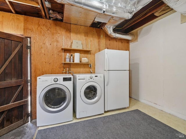 9 Park St, San Rafael, CA 94901 - laundry area featuring washer and dryer and wooden walls