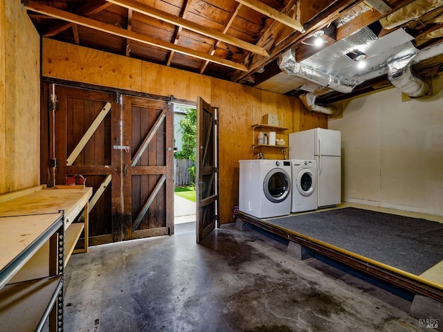9 Park St, San Rafael, CA 94901 - below grade area with freestanding refrigerator, wooden walls, and washer and dryer