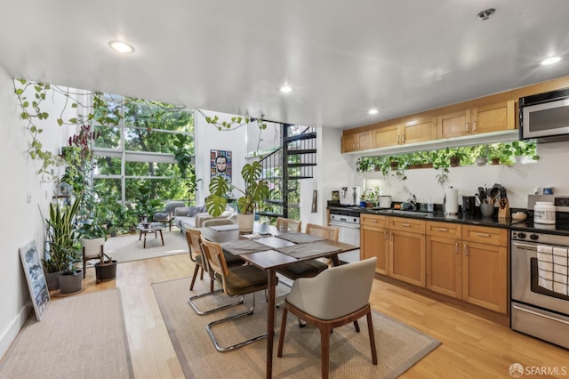 699 Pennsylvania Ave Unit 10, San Francisco, CA 94107 - dining room featuring light wood finished floors and recessed lighting
