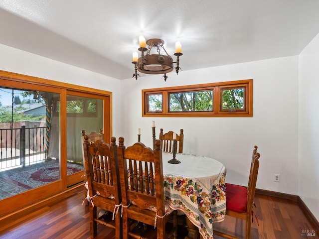 1010 Easum Dr, Napa, CA 94558 - dining space featuring wood finished floors, baseboards, and a chandelier