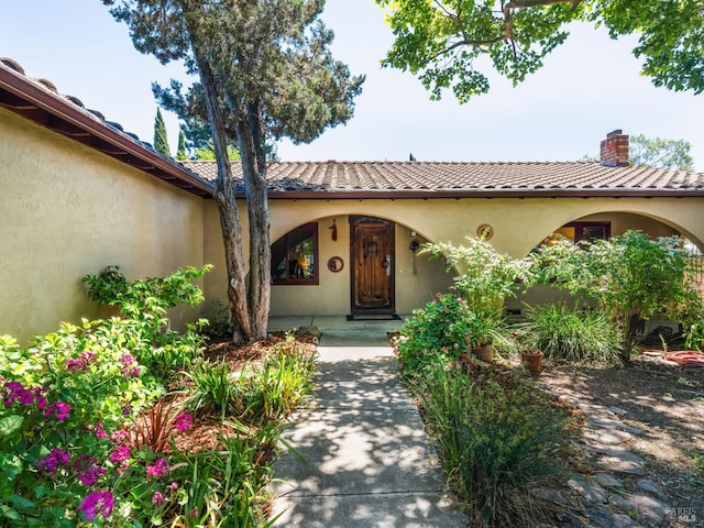 1010 Easum Dr, Napa, CA 94558 - view of front facade featuring a chimney and stucco siding