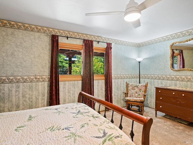 1010 Easum Dr, Napa, CA 94558 - bedroom featuring carpet flooring, wallpapered walls, a wainscoted wall, and a ceiling fan
