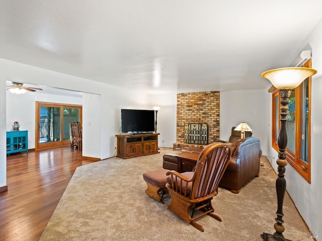 1010 Easum Dr, Napa, CA 94558 - living area featuring a fireplace, a ceiling fan, and wood finished floors