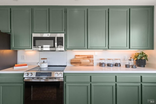 34 Laurel Dr, Corte Madera, CA 94925 - kitchen featuring green cabinets, appliances with stainless steel finishes, and light countertops