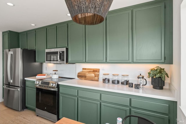 34 Laurel Dr, Corte Madera, CA 94925 - kitchen featuring appliances with stainless steel finishes, green cabinets, and recessed lighting