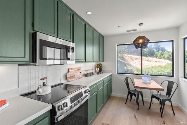 34 Laurel Dr, Corte Madera, CA 94925 - kitchen with green cabinets, stainless steel appliances, plenty of natural light, and recessed lighting