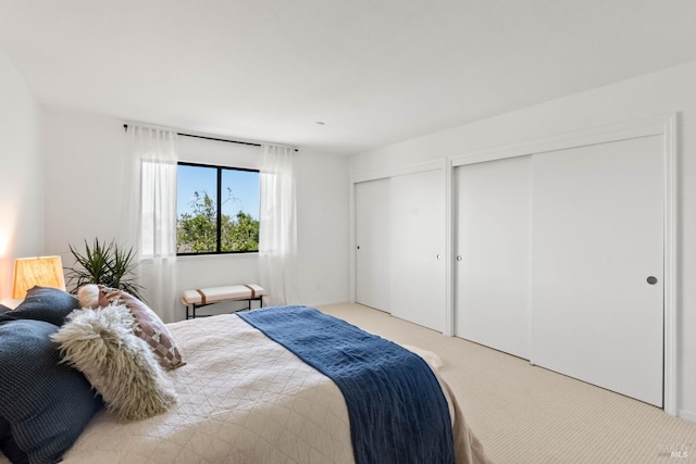 34 Laurel Dr, Corte Madera, CA 94925 - bedroom featuring two closets and light colored carpet