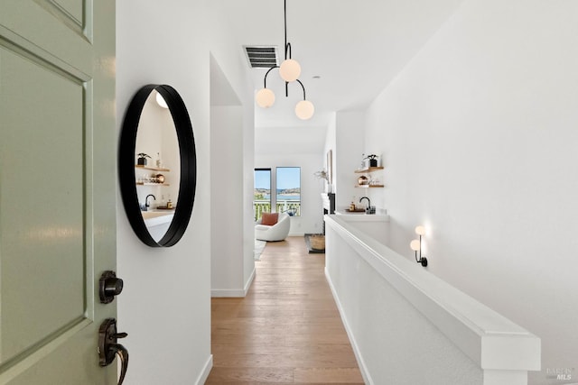 34 Laurel Dr, Corte Madera, CA 94925 - corridor with light wood-type flooring and baseboards