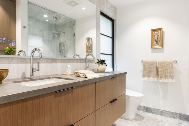 225 W Baltimore Ave, Larkspur, CA 94939 - full bath with double vanity, a marble finish shower, toilet, and decorative backsplash