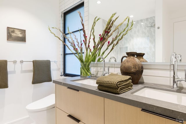 225 W Baltimore Ave, Larkspur, CA 94939 - full bathroom with double vanity, toilet, a shower, and healthy amount of natural light