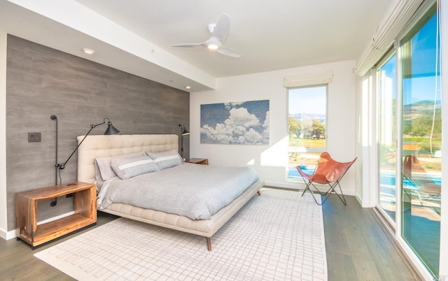 1090 1st Ave Unit A, Napa, CA 94558 - bedroom featuring access to exterior, wood finished floors, a ceiling fan, baseboards, and wooden walls