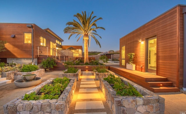 1090 1st Ave Unit A, Napa, CA 94558 - view of yard featuring stairs, a vegetable garden, and a deck