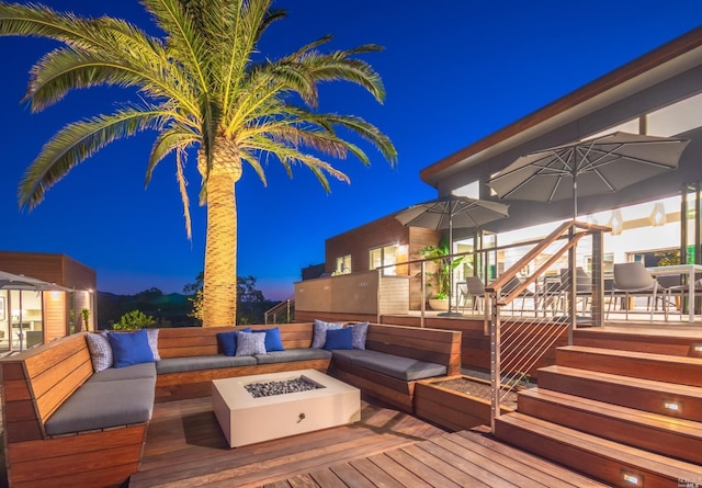 1090 1st Ave Unit A, Napa, CA 94558 - deck at twilight featuring an outdoor living space with a fire pit and stairway