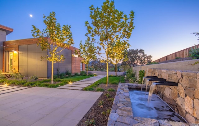 1090 1st Ave Unit A, Napa, CA 94558 - yard at dusk with a patio