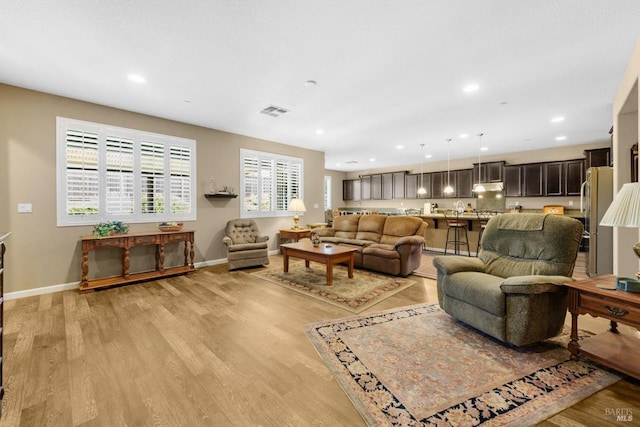 2234 Pullen Ln, Fairfield, CA 94533 - living room with light wood-type flooring, baseboards, and recessed lighting