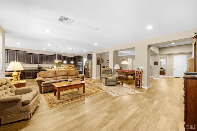2234 Pullen Ln, Fairfield, CA 94533 - living room featuring light wood-style floors, recessed lighting, and baseboards