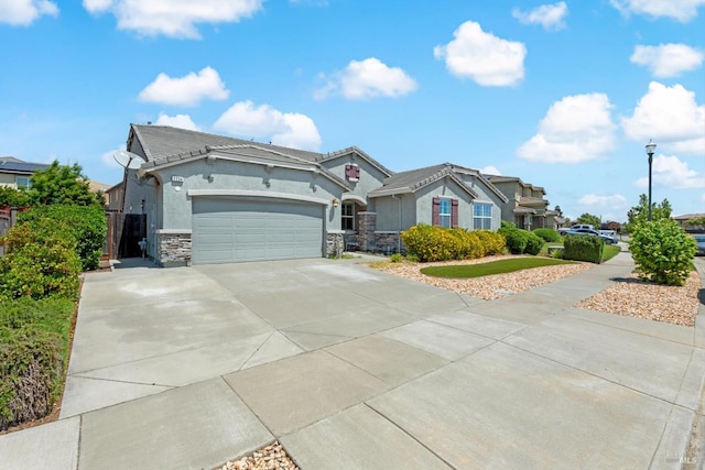 2234 Pullen Ln, Fairfield, CA 94533 - view of front of home with driveway, an attached garage, stone siding, and stucco siding