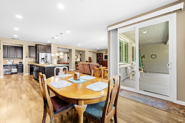 2234 Pullen Ln, Fairfield, CA 94533 - dining space featuring light wood finished floors, baseboards, and recessed lighting