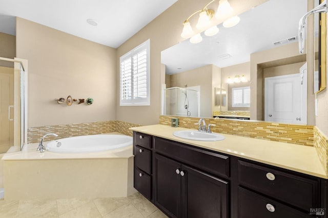 2234 Pullen Ln, Fairfield, CA 94533 - bathroom with a shower stall, decorative backsplash, a bath, vanity, and tile patterned flooring