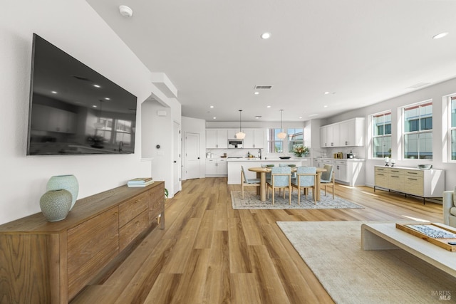 1480 Waterside Ln, Rohnert Park, CA 94928 - living room featuring light wood-type flooring and recessed lighting